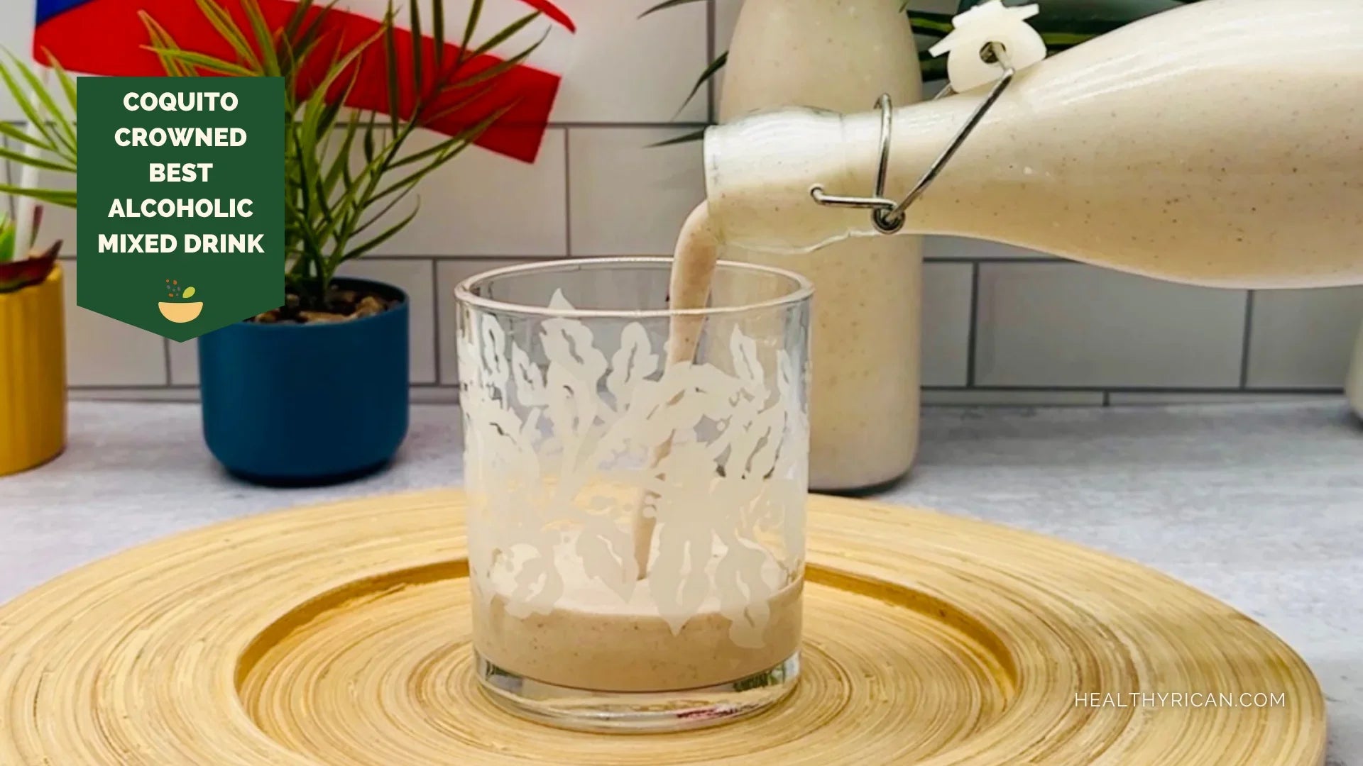Puerto Rican Coquito being poured into a glass, highlighting the creamy holiday drink celebrated as the best alcoholic mixed drink in the world.