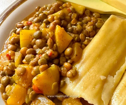 Puerto Rican cooking featuring Asopao de Gandules with pigeon peas, potatoes, pasteles, and sliced avocado.